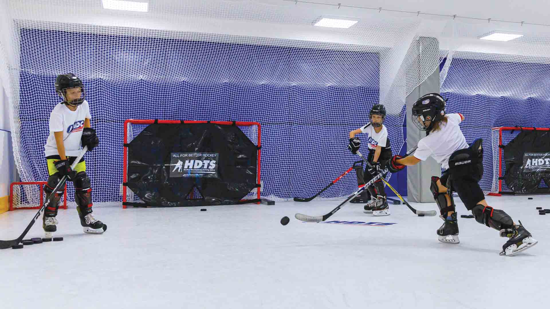 hockey training in shooting zone with synthetic ice